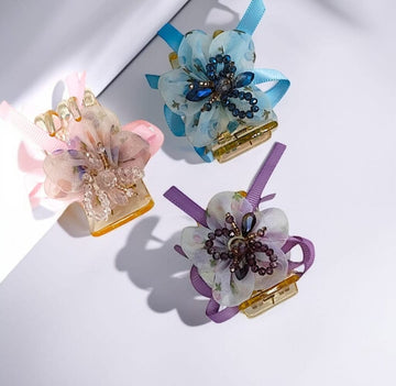 Floral ribbon and beaded embellishments.